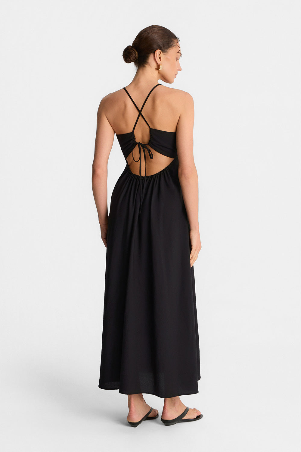 amara maxi dress black Black midi dress with straps and a decorative tie at the back